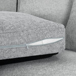 Gray textured fabric sofa with a zipper detail
