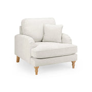 Light gray armchair with wooden legs 