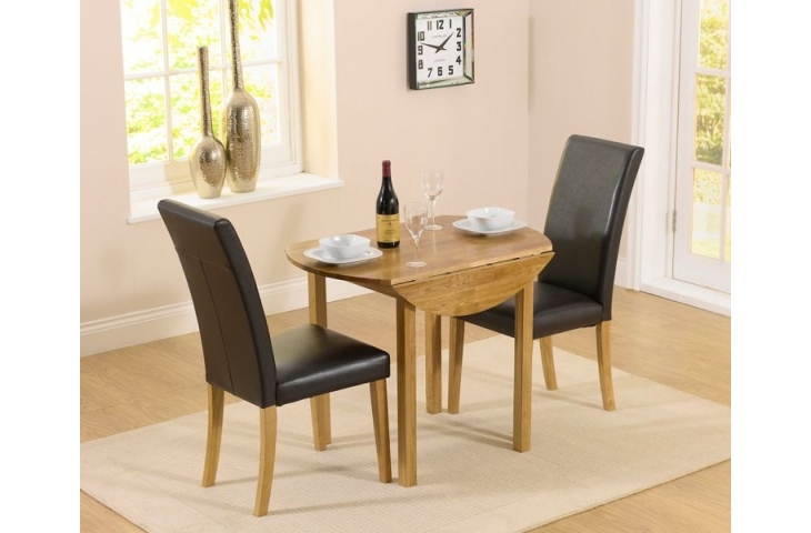 Atlanta Black Faux Leather Chairs, Round Dining Table And Faux Leather Chairs
